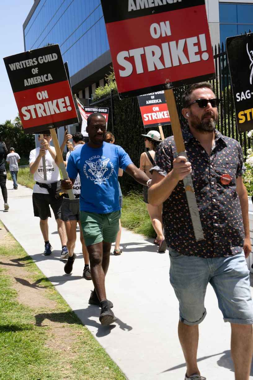 Men walking the picket line, Photo by Nicholas Mageras on Pexels.com