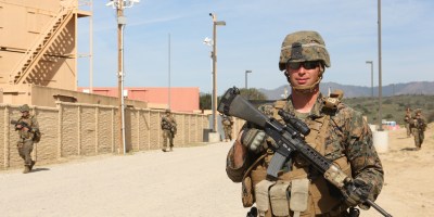 Cpl. Russ J. Bhyre walks in a tactical column with his squad during a patrol at Camp Pendleton March 3, 2016. Marines with 1st Law Enforcement Battalion performed a five-day offensive training evolution in an effort to better integrate military police officers with infantry units. Bhyre, a native of Minneapolis, is a military policeman with Company B, 1st LE Bn., I Marine Expeditionary Force. (U.S. Marine Corps photo by Lance Cpl. Justin E. Bowles/Released)