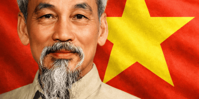 Portrait of Ho Chi Minh with the red Vietnamese flag featuring a yellow star in the background.
