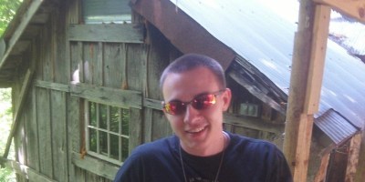 Warren Don Potts smiling outdoors in August 2023.